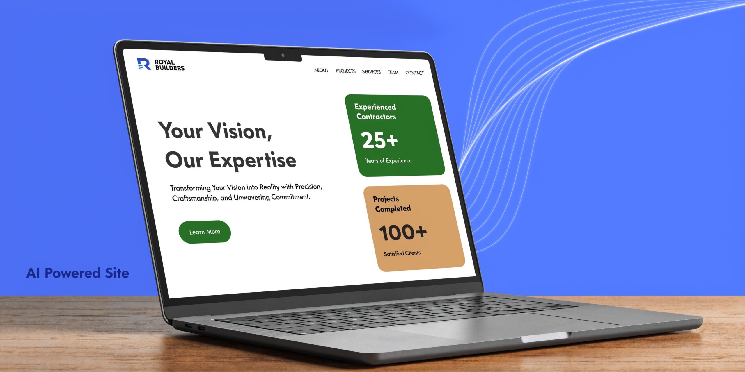 A laptop on a wooden desk displaying the professional website of Royal Builders construction company.